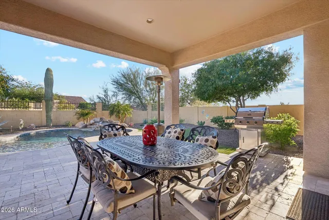 a view of swimming pool from a lounge chair