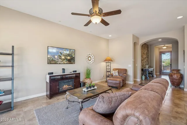 a kitchen with stainless steel appliances kitchen island granite countertop a table and chairs