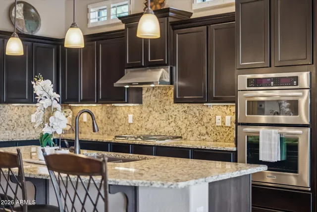 a kitchen with counter space cabinets and appliances