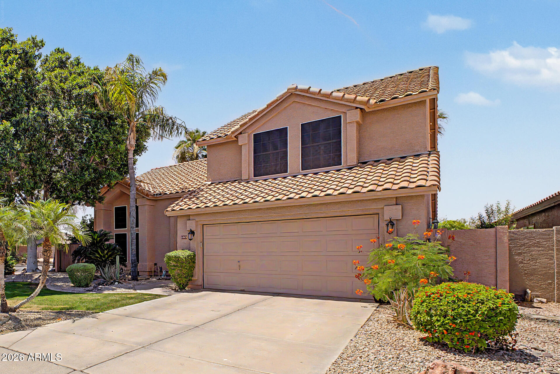 3948 North Ranier Mesa, AZ 85215 - Photo 6 of 69 a front view of a house with a garden