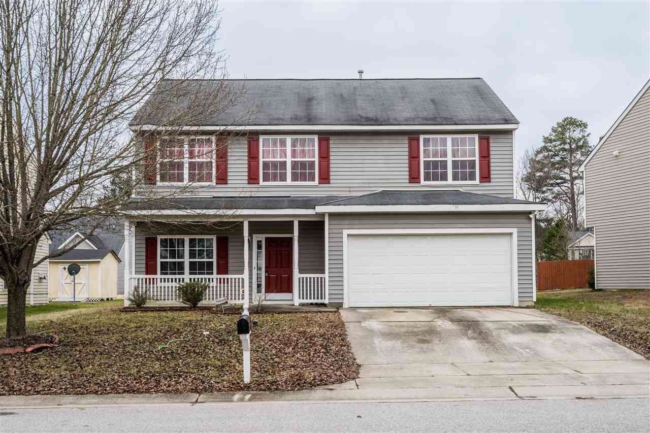3130 Rendezvous Drive Raleigh, NC 27610 - Photo 1 of 22 a front view of a house with garage and garage