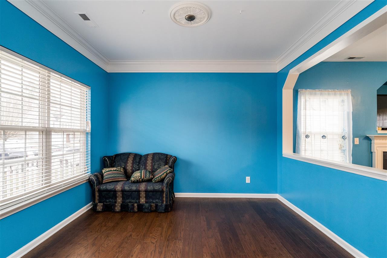 3130 Rendezvous Drive Raleigh, NC 27610 - Photo 11 of 22 a living room with furniture and a window
