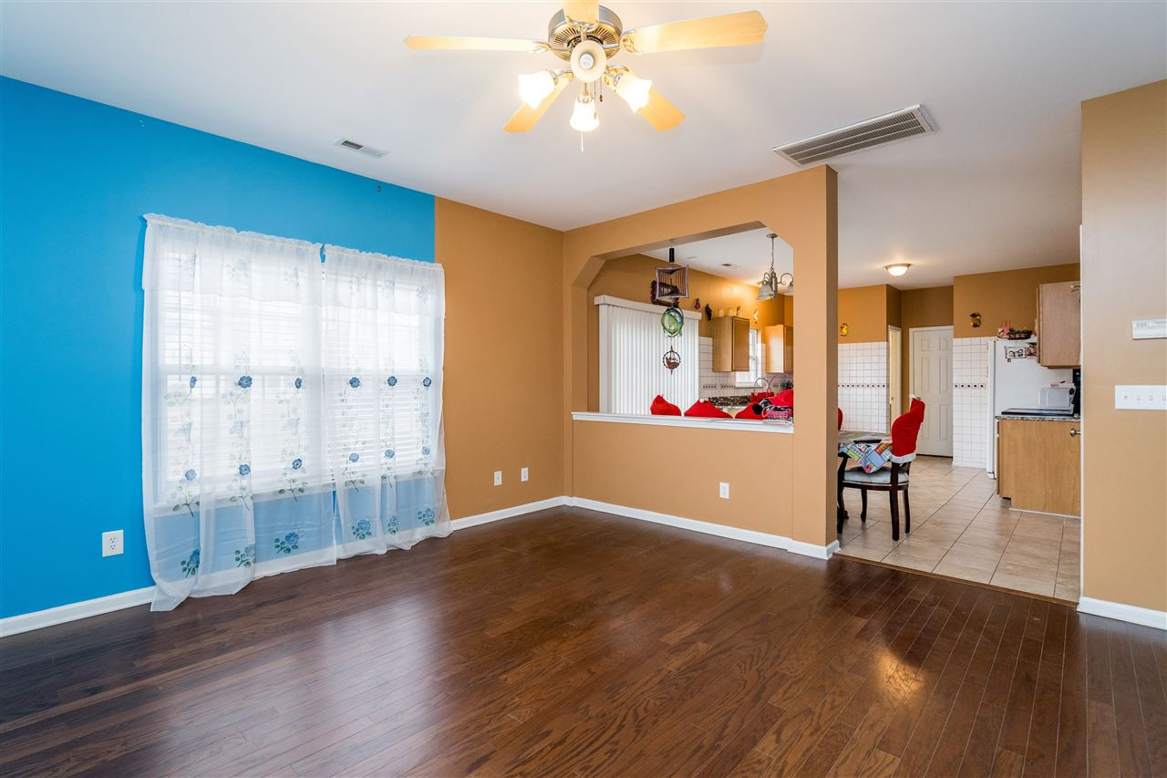 3130 Rendezvous Drive Raleigh, NC 27610 - Photo 9 of 22 a view of livingroom with furniture and wooden floor