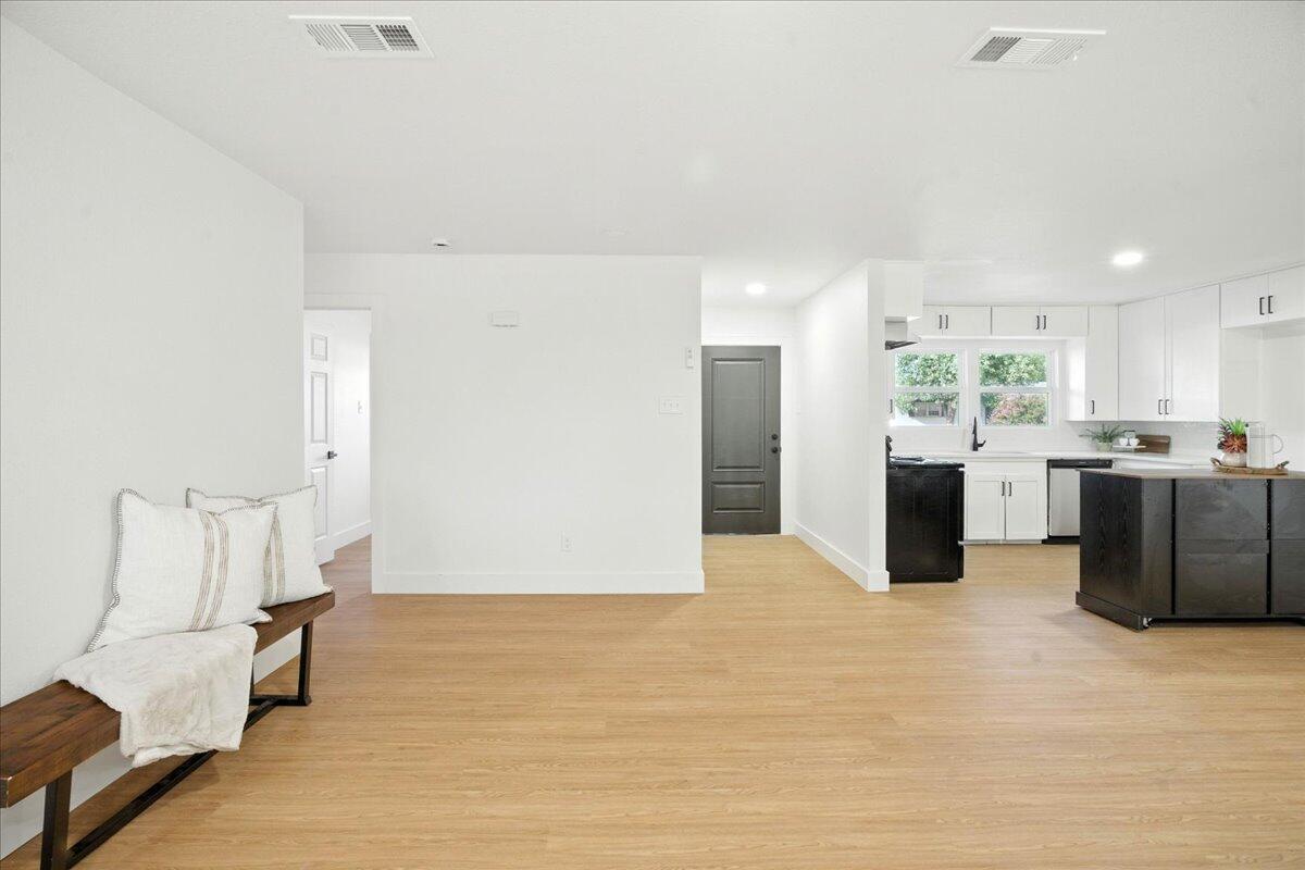 1308 59th Street Lubbock, TX 79412 - Photo 11 of 28 a view of kitchen with furniture and refrigerator