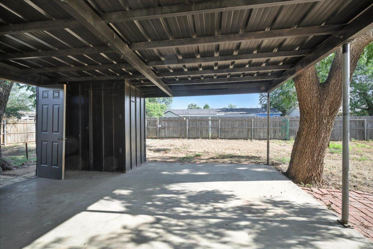 1308 59th Street Lubbock, TX 79412 - Photo 26 of 28 a view of a garage