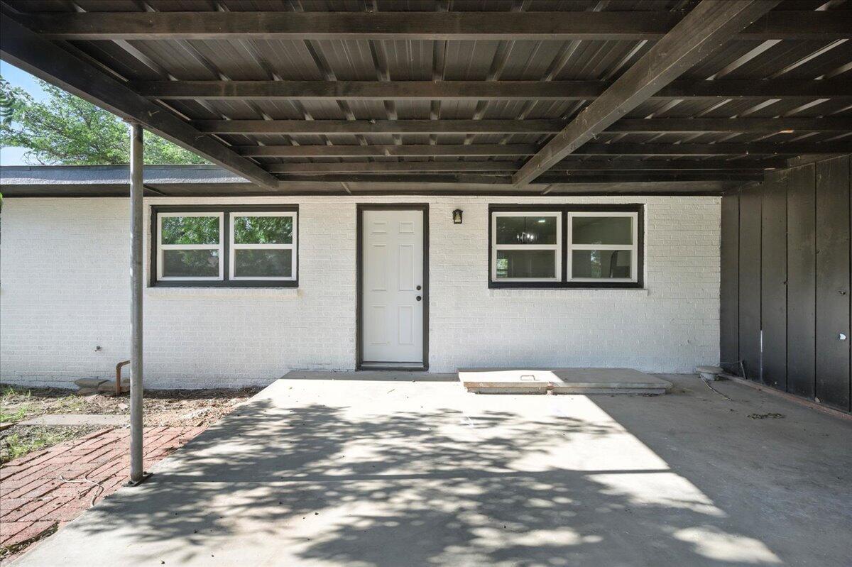 1308 59th Street Lubbock, TX 79412 - Photo 27 of 28 a view of a front door