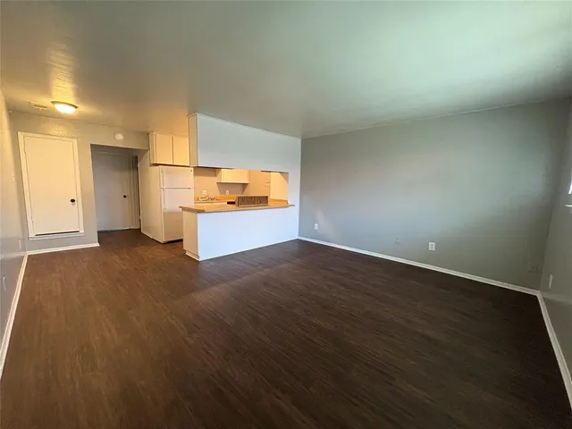 a view of a kitchen with a sink and a stove