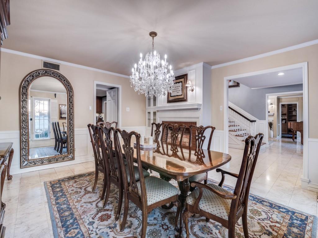 343 East Tripp Road Sunnyvale, TX 75182 - Photo 6 of 36 a dining room with furniture and chandelier