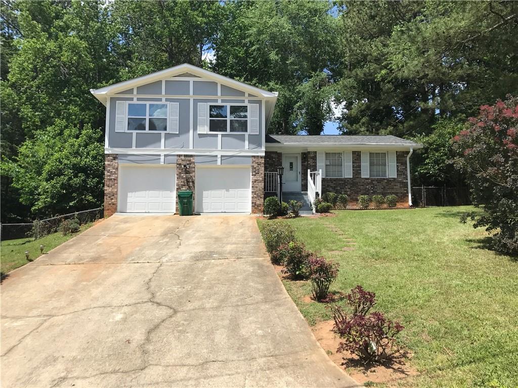 4189 Northstrand Drive Decatur, GA 30035 - Photo 1 of 1 a front view of a house with a yard