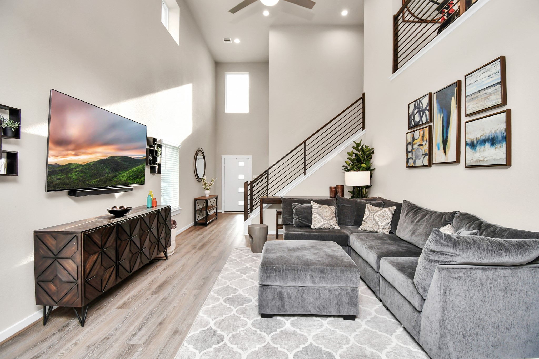12505 Walmgate Court Houston, TX 77047 - Photo 3 of 31 The spacious living room offers high ceilings and lots of natural light!