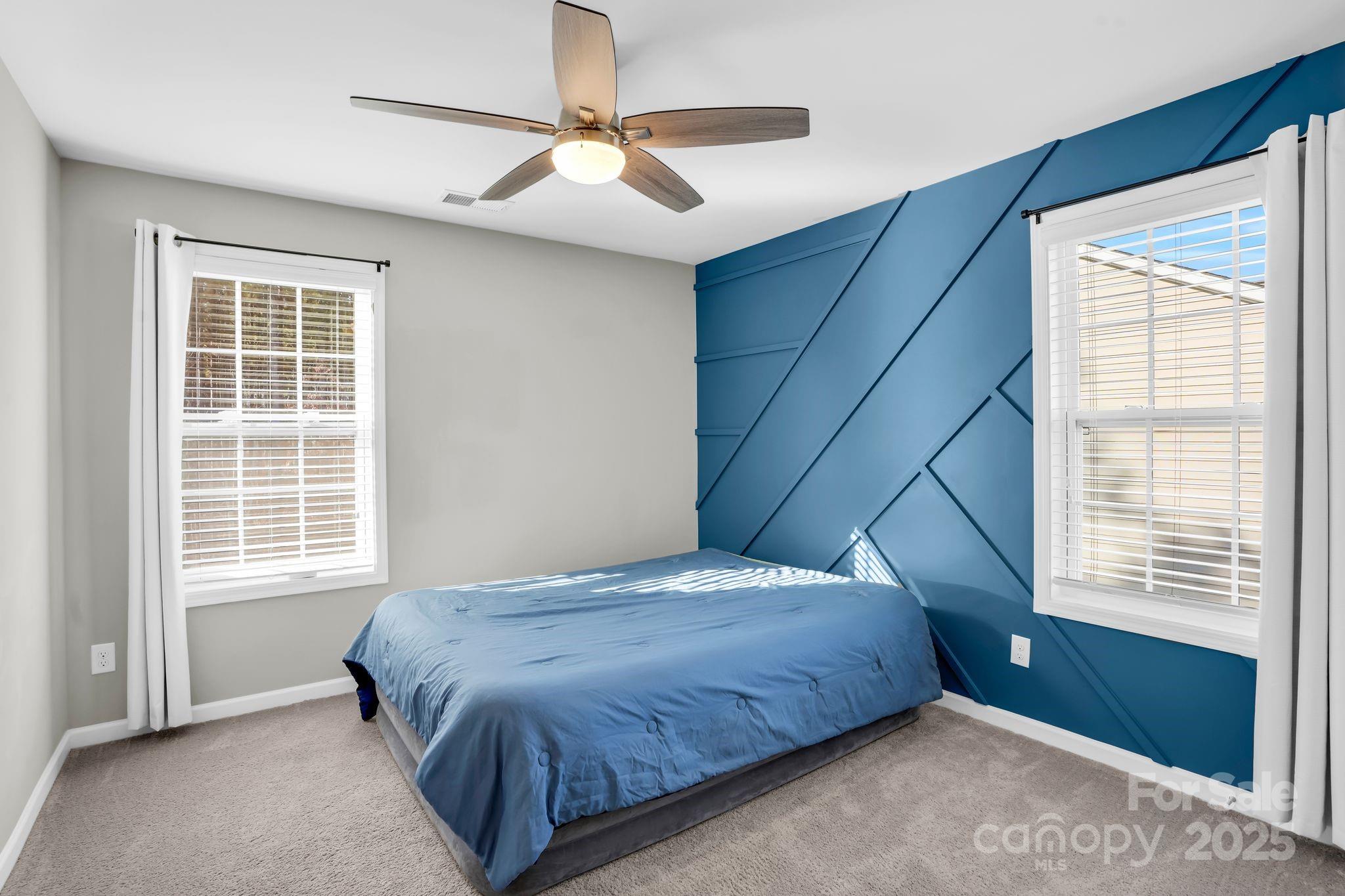 9507 Inverness Bay Road Charlotte, NC 28278 - Photo 20 of 29 a bedroom with a bed and a window