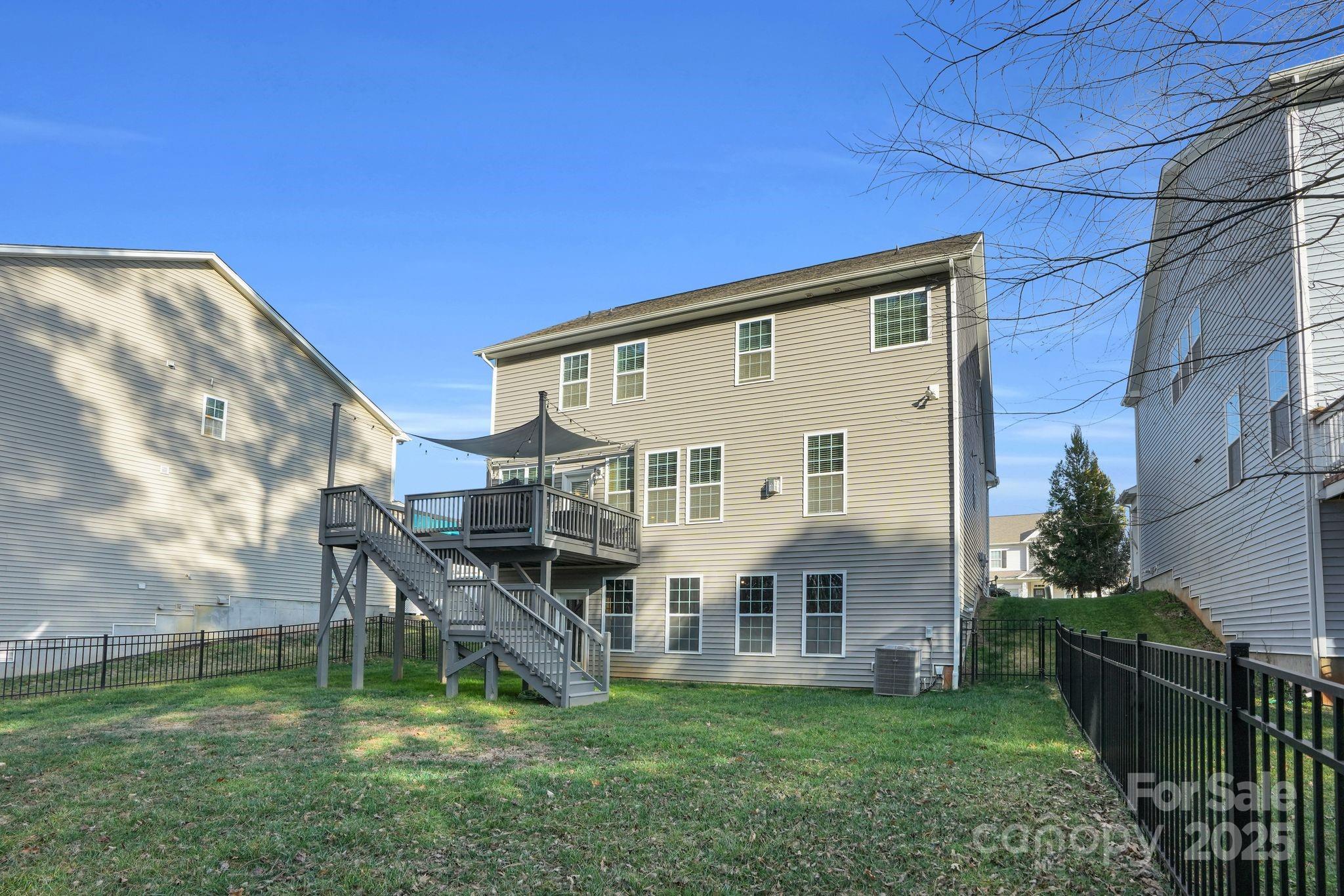 9507 Inverness Bay Road Charlotte, NC 28278 - Photo 26 of 29 a view of a house with a yard