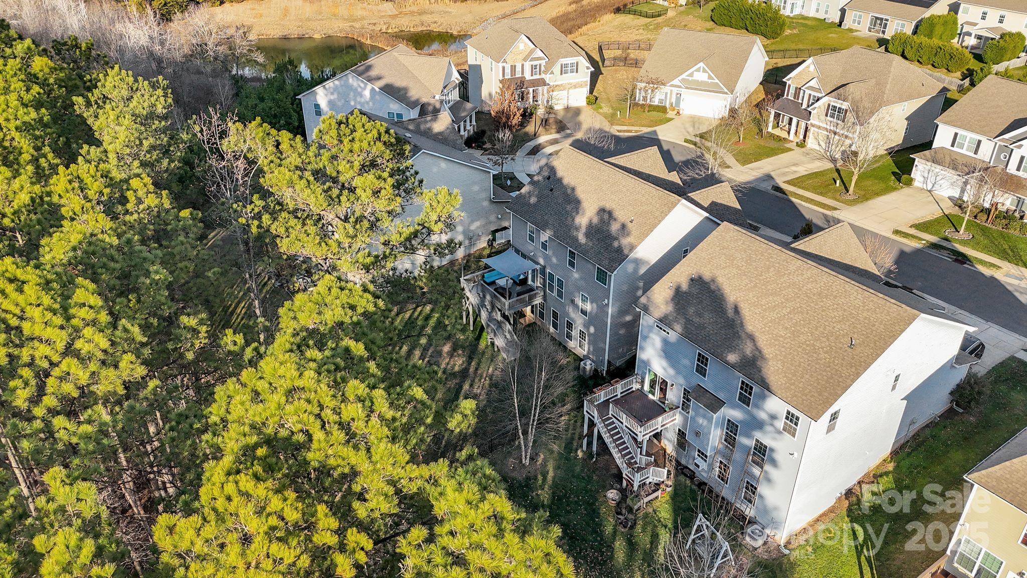 9507 Inverness Bay Road Charlotte, NC 28278 - Photo 28 of 29 a view of a yard with plants