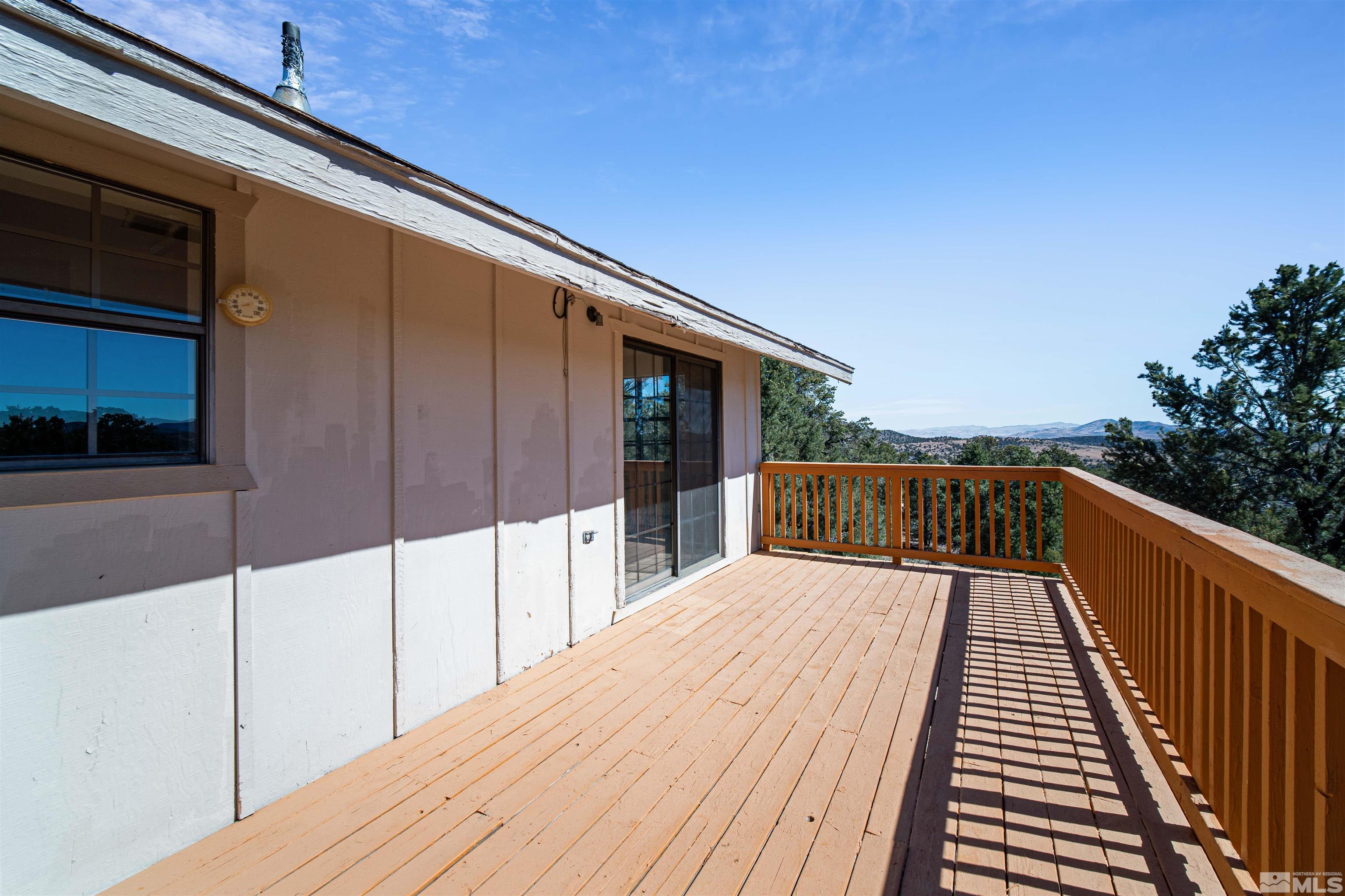 1960 Silverado Road Reno, NV 89521 - Photo 11 of 39 a view of balcony and wooden floor