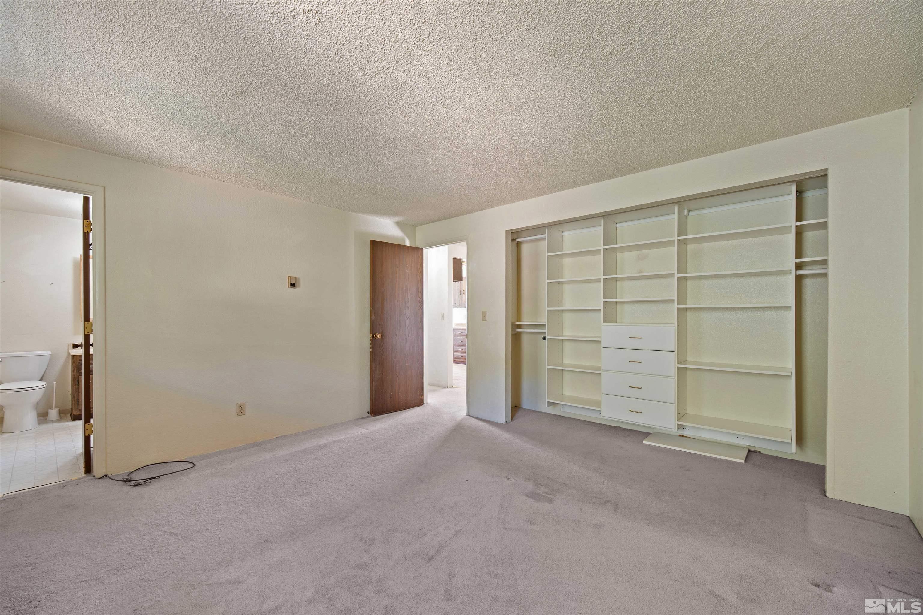 1960 Silverado Road Reno, NV 89521 - Photo 13 of 39 an empty room with closet area