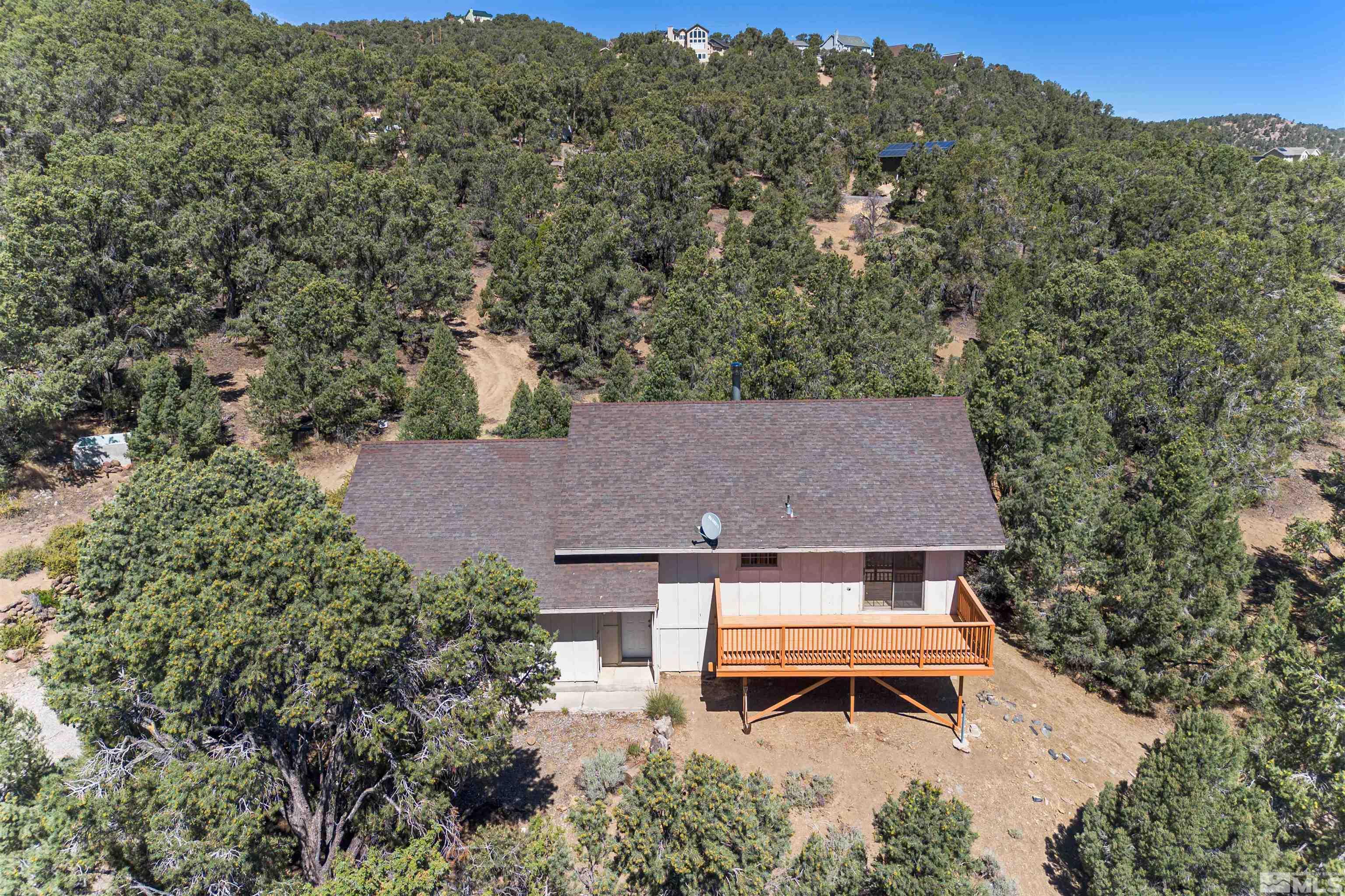 1960 Silverado Road Reno, NV 89521 - Photo 2 of 39 an aerial view of a house with a yard