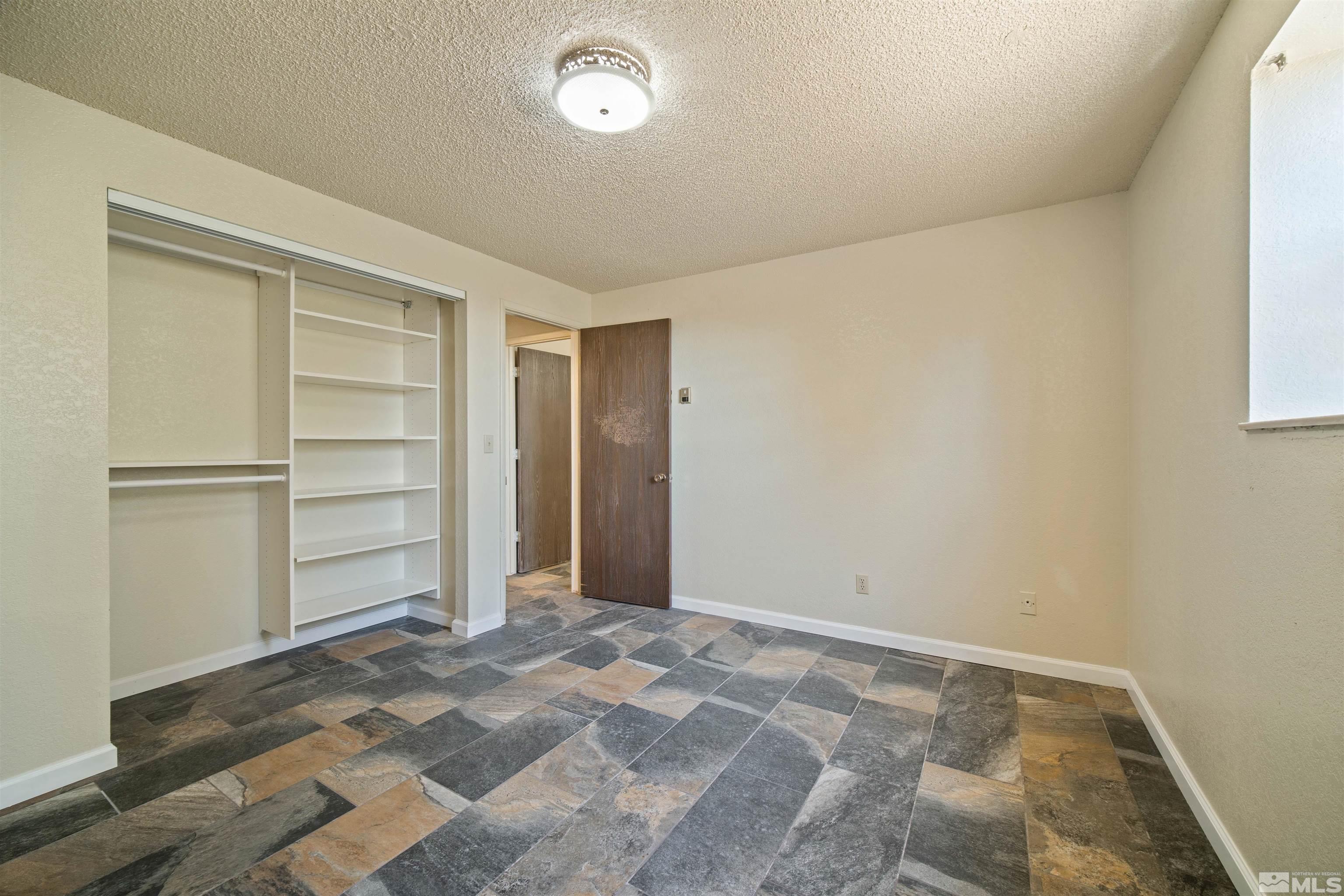 1960 Silverado Road Reno, NV 89521 - Photo 21 of 39 a view of an empty room