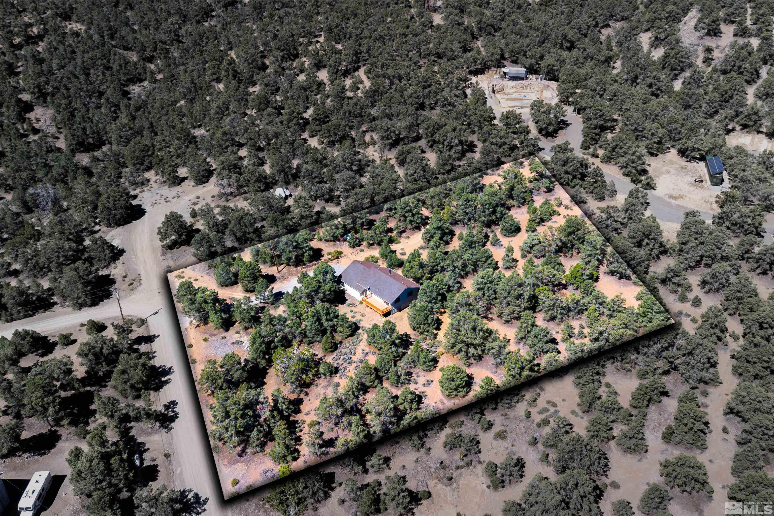 1960 Silverado Road Reno, NV 89521 - Photo 34 of 39 an aerial view of a residential house with parking space