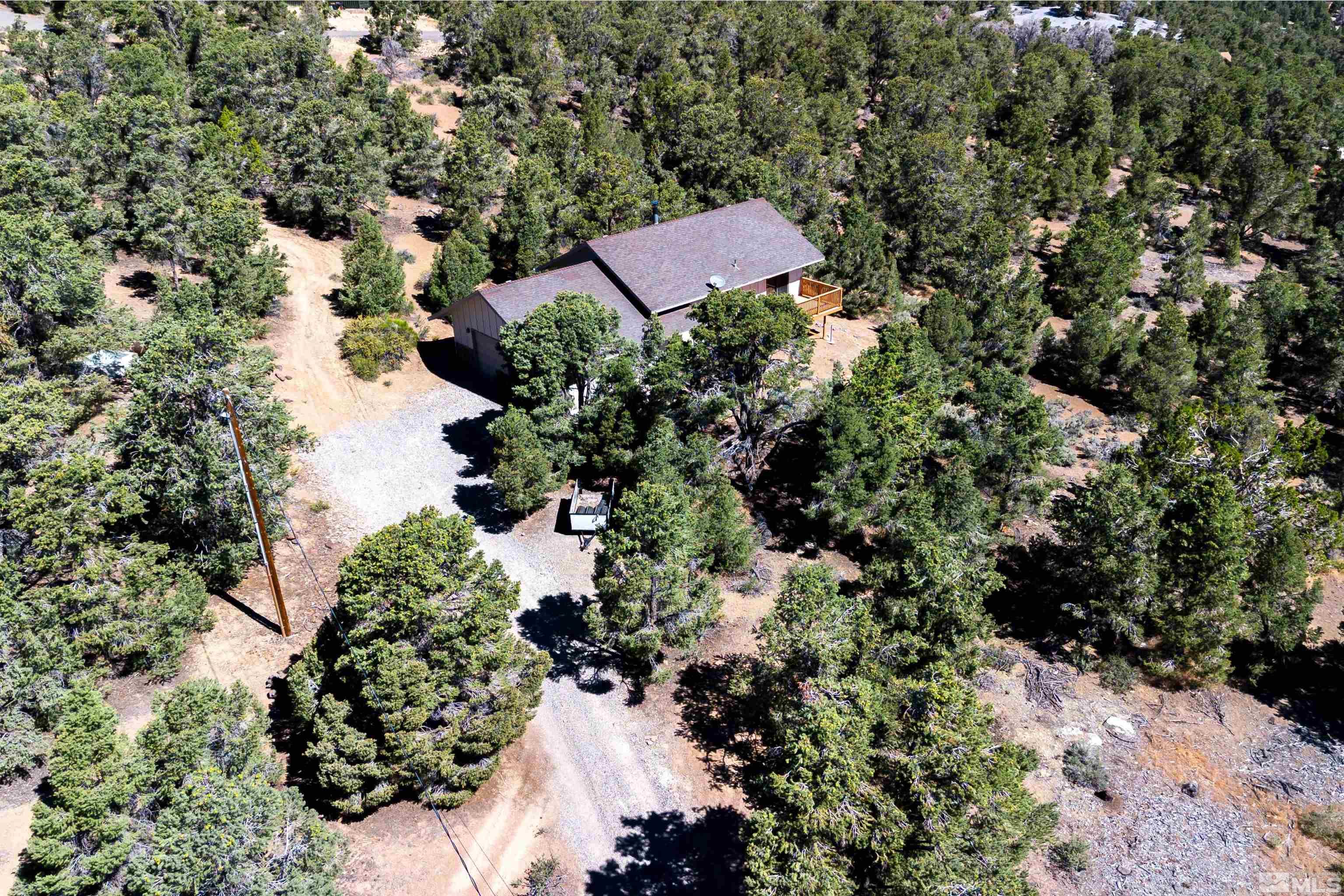 1960 Silverado Road Reno, NV 89521 - Photo 38 of 39 an aerial view of a house with a yard and lake view