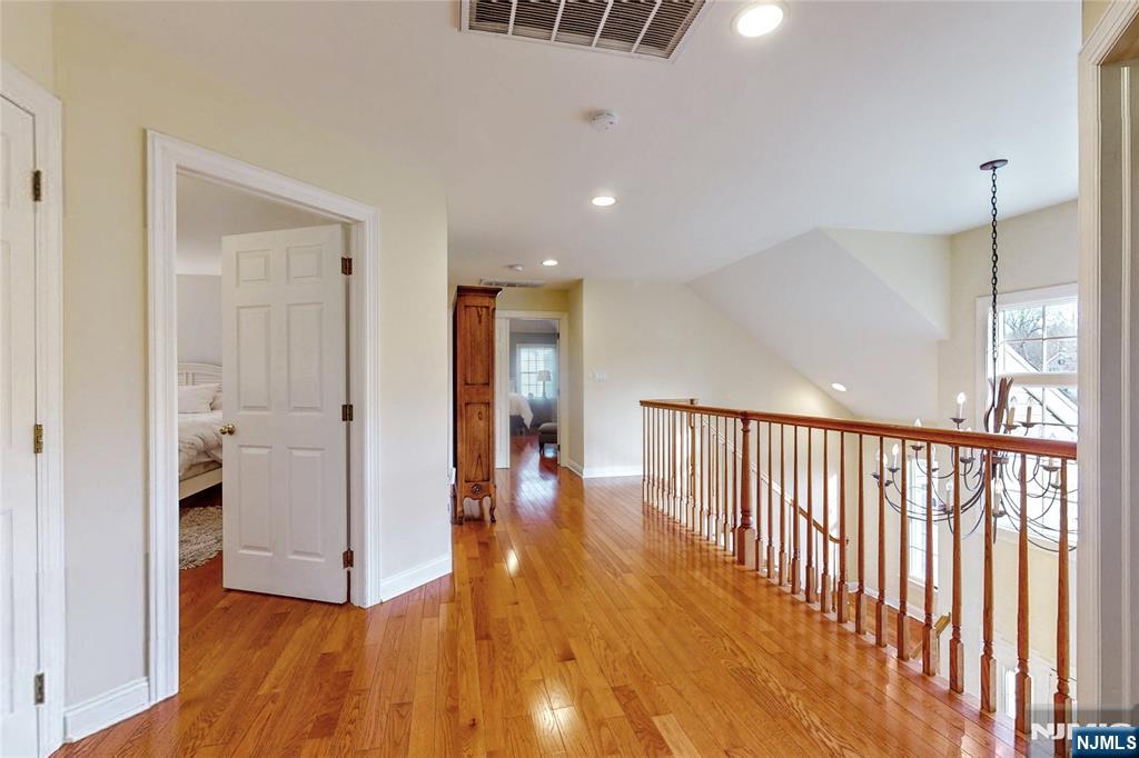 10 Hope Street Montvale, NJ 07645 - Photo 19 of 44 a view of a hallway with wooden floor