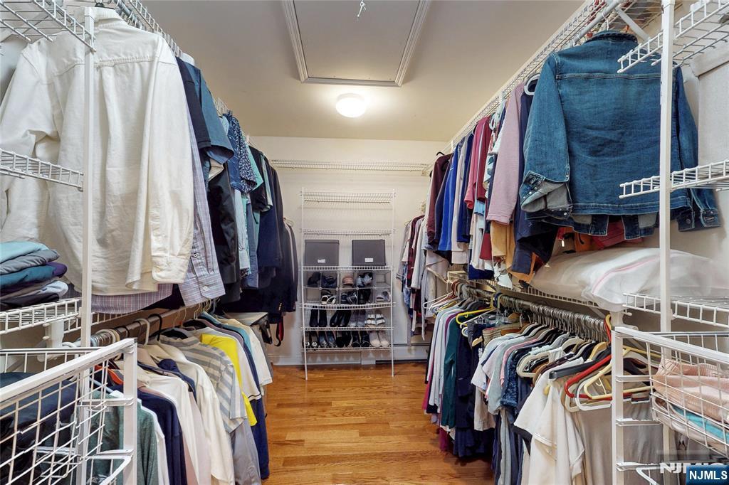 10 Hope Street Montvale, NJ 07645 - Photo 26 of 44 a view of walk in closet with clothes and shoes