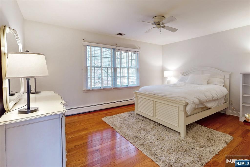 10 Hope Street Montvale, NJ 07645 - Photo 27 of 44 a spacious bedroom with a bed and a window
