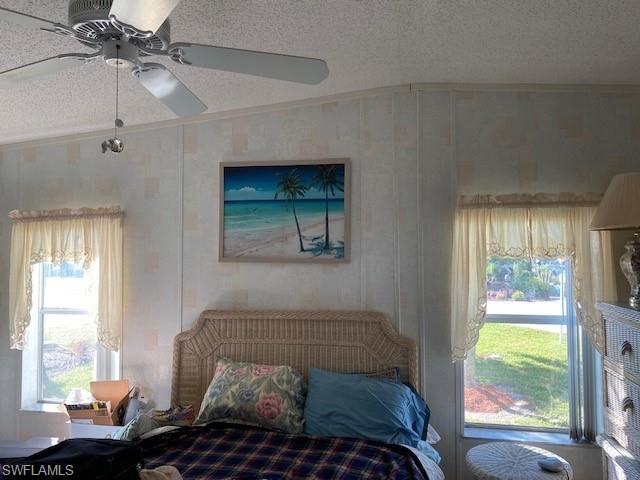 222 Riverwood Road Naples, FL 34114 - Photo 12 of 23 a bedroom with a bed and a window
