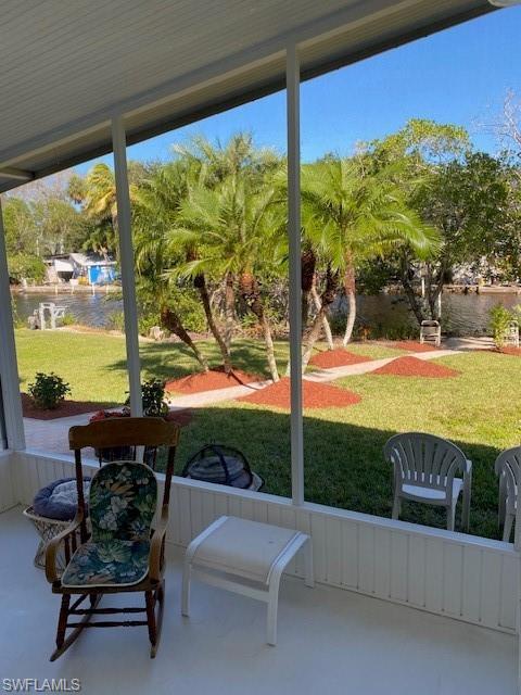 222 Riverwood Road Naples, FL 34114 - Photo 13 of 23 a view of a swimming pool and outdoor space