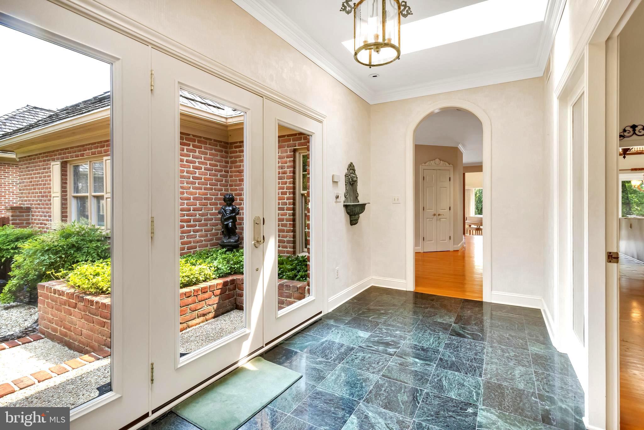 1070 South River Landing Road Edgewater, MD 21037 - Photo 13 of 64 Sleek Marble Floor & Beckoning Arched Doorway