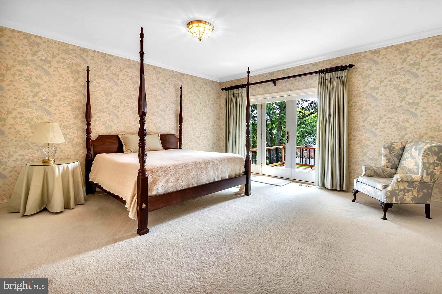 1070 South River Landing Road Edgewater, MD 21037 - Photo 34 of 64 Generous Primary BR Accessing Treetop Deck