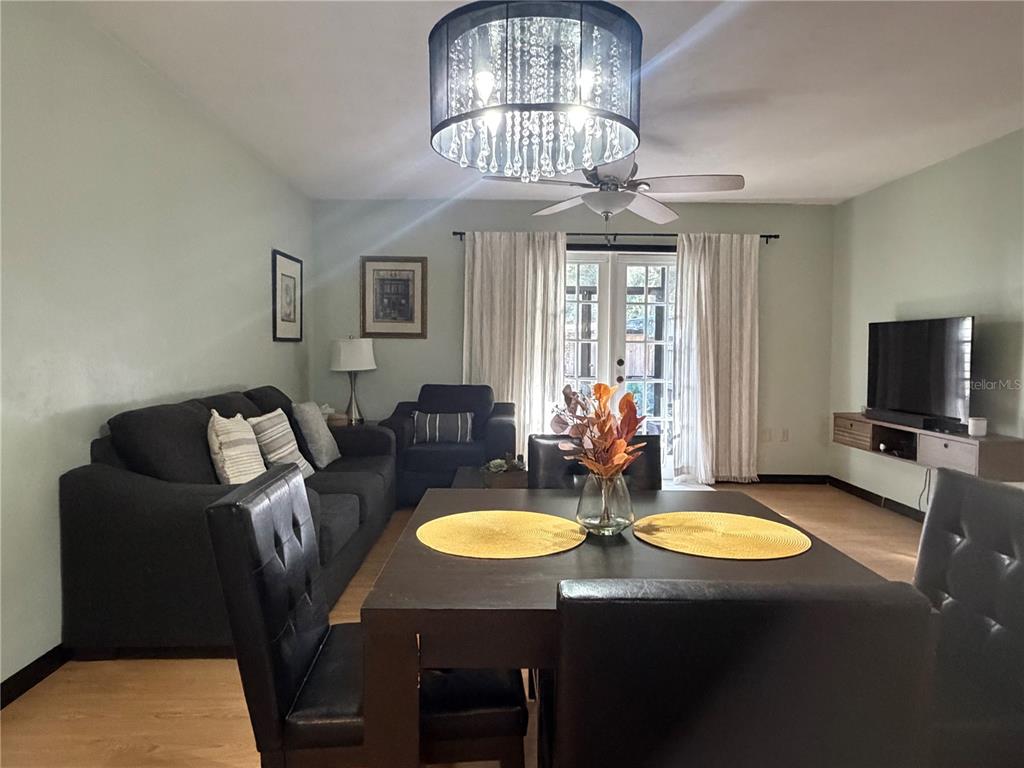 5216 Southwest 92nd Court Gainesville, FL 32608 - Photo 15 of 32 a view of a dining room with furniture