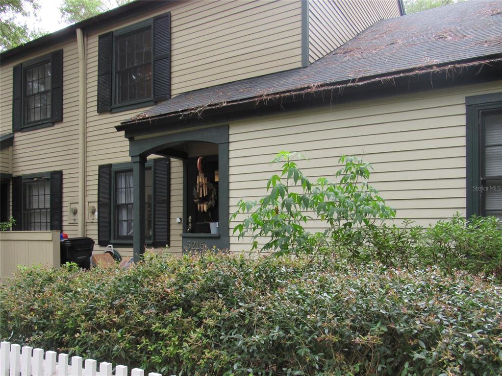 5216 Southwest 92nd Court Gainesville, FL 32608 - Photo 2 of 32 a view of a house with potted plants