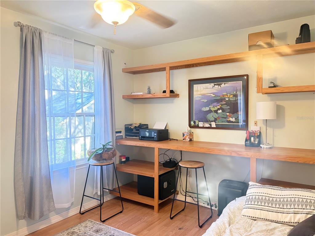 5216 Southwest 92nd Court Gainesville, FL 32608 - Photo 22 of 32 a room with furniture and a window