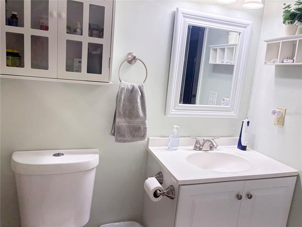 5216 Southwest 92nd Court Gainesville, FL 32608 - Photo 24 of 32 a bathroom with a sink and a toilet