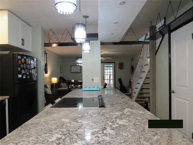 a view of a hallway view with staircase