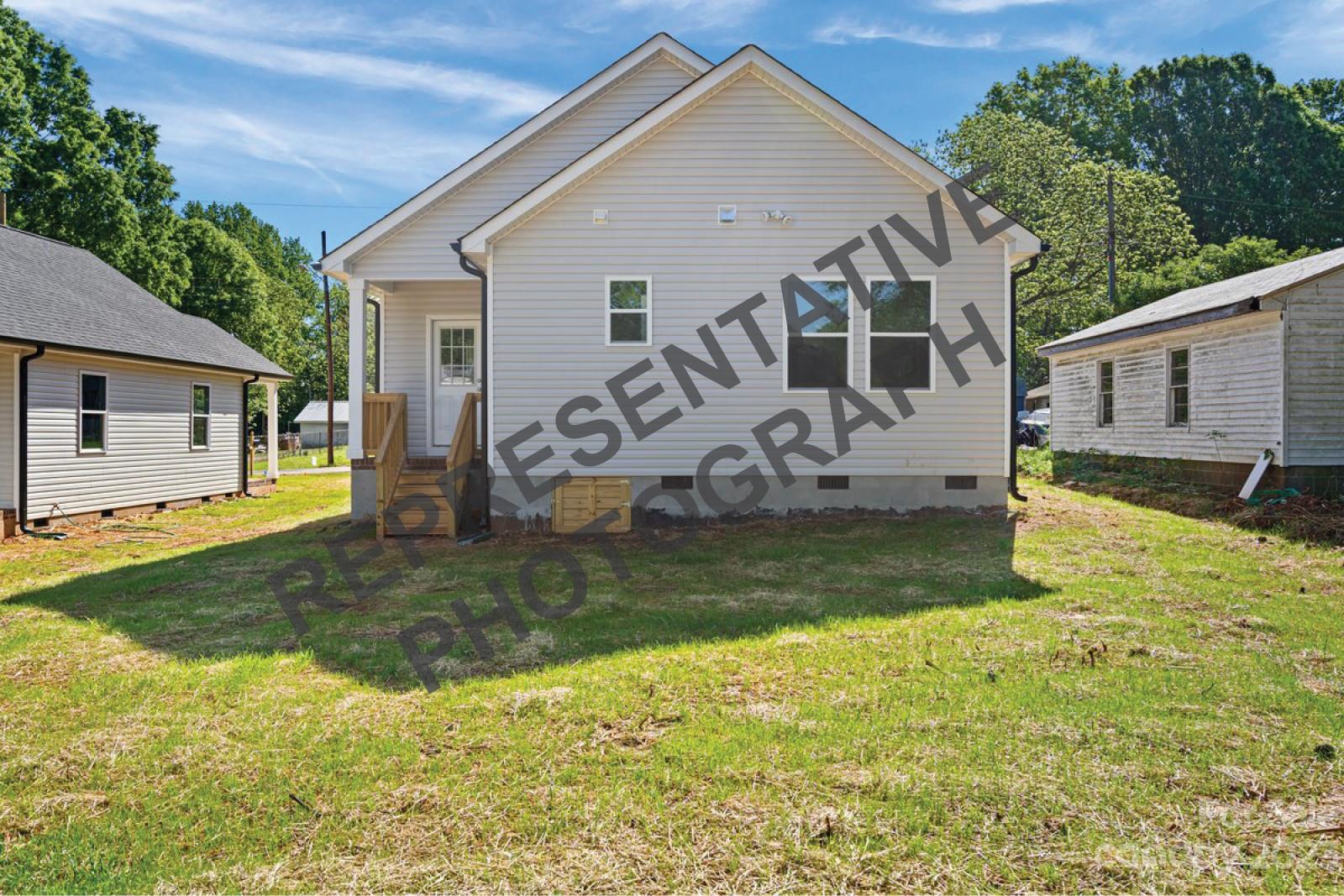 422 Queens Road Gastonia, NC 28052 - Photo 18 of 18 a view of a house with backyard