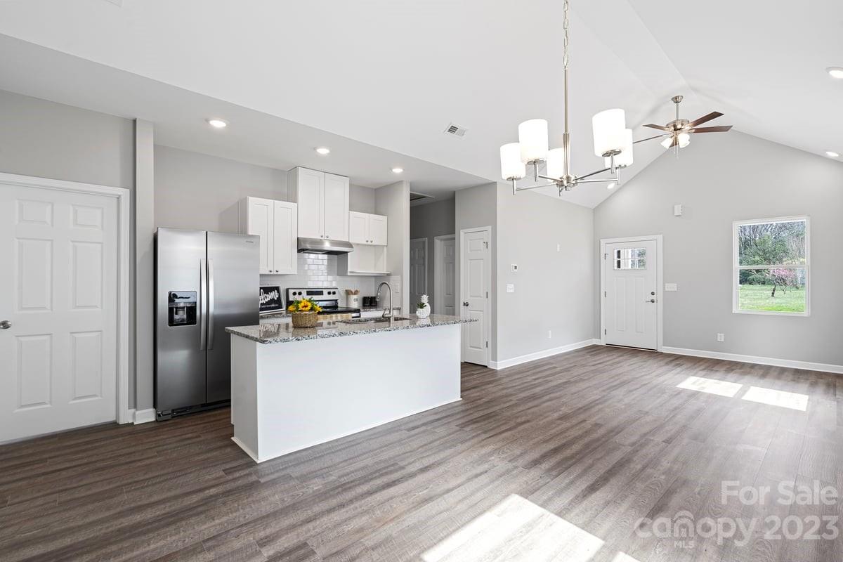 422 Queens Road Gastonia, NC 28052 - Photo 5 of 18 a view of a kitchen with wooden floor