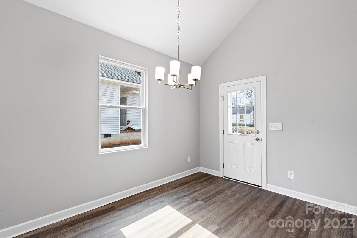 422 Queens Road Gastonia, NC 28052 - Photo 6 of 18 a view of a room with window and wooden floor