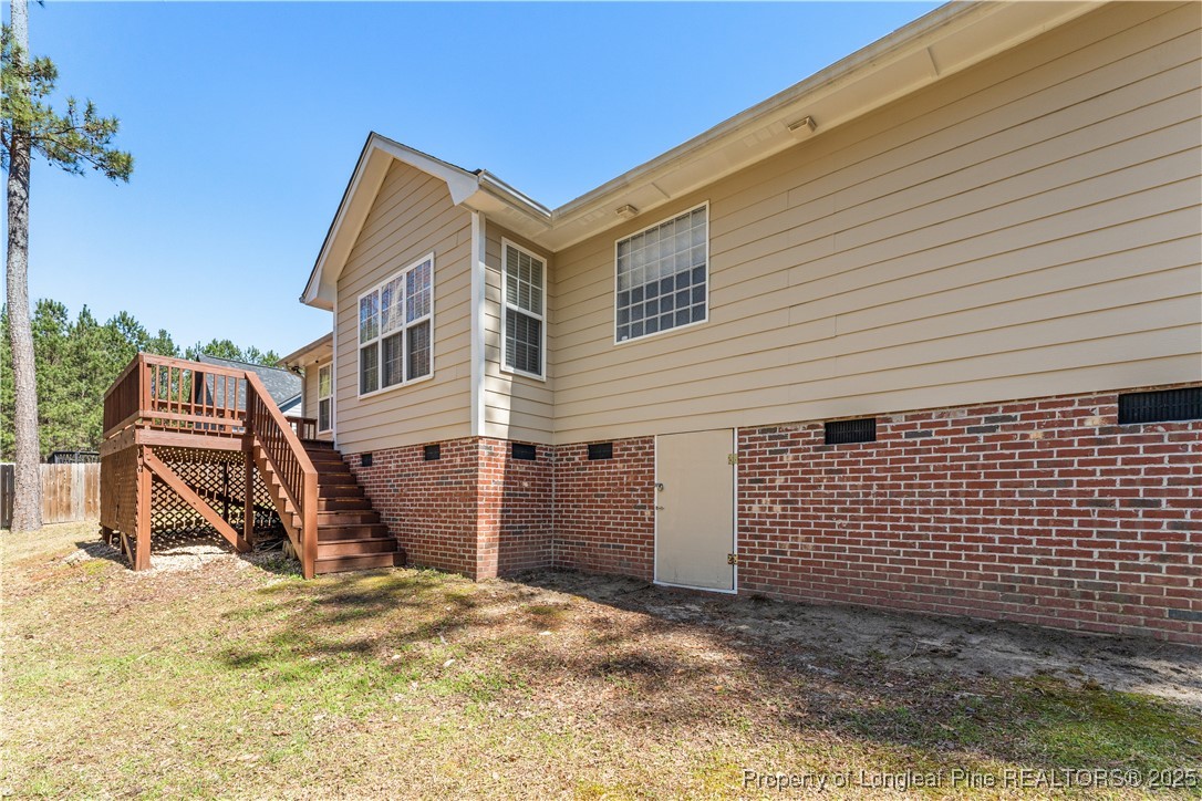 292 Falling Leaf Drive Raeford, NC 28376 - Photo 33 of 40 a view of a house with backyard