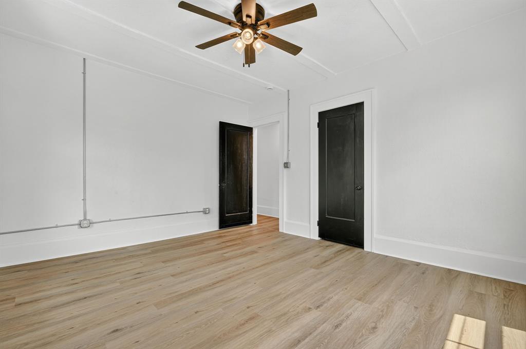 513 Northwest 6th Street, Unit 4 Mineral Wells, TX 76067 - Photo 26 of 34 a view of empty room with wooden floor