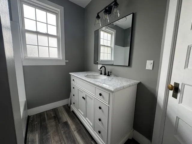 a view of a room with rack on the wall