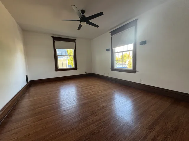 a utility room with cabinets washer and dryer