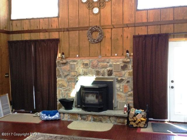 182 Edinburgh Road Bushkill, PA 18324 - Photo 11 of 41 living room fireplace