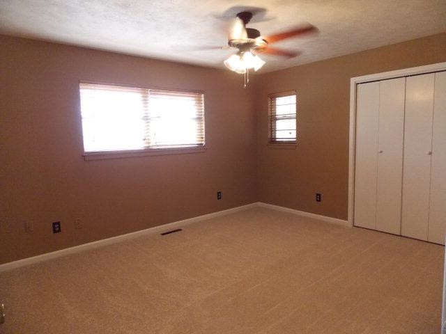 4702 31st Street Lubbock, TX 79410 - Photo 7 of 10 a view of an empty room with a window