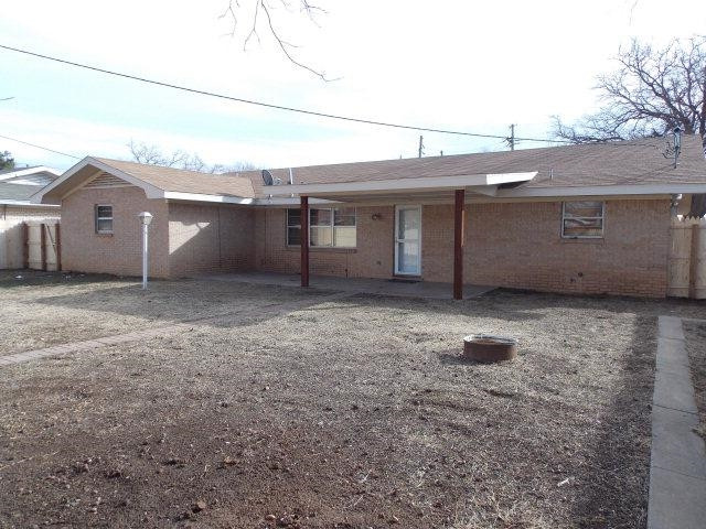 4702 31st Street Lubbock, TX 79410 - Photo 10 of 10 a view of a house with a backyard