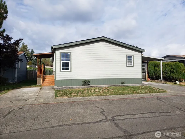 a house view with a backyard space
