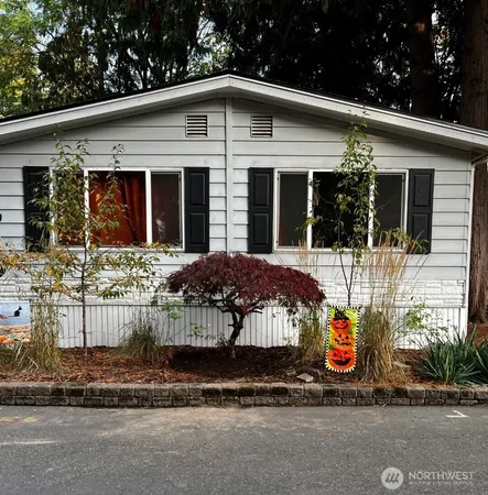 a front view of a house with a porch