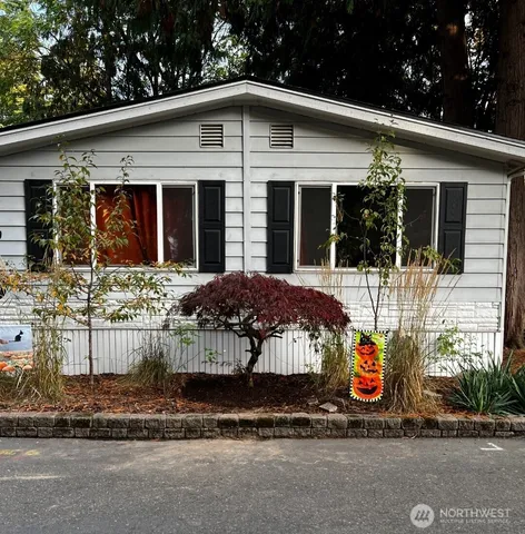 a front view of a house with a porch