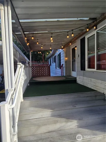 a view of a porch with a bench
