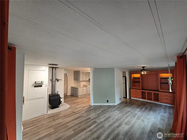 a view of a livingroom with wooden floor